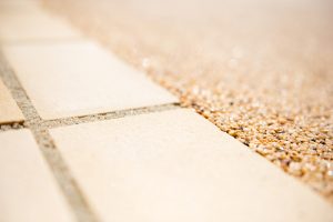 Close up of natural stone laid next to resin (2)